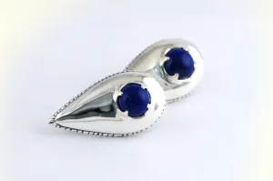 Small arrowhead stud earrings with blue lapis lazuli